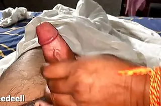 Plump Indian dame is purveying a hand job to her paramour and hoping to get banged, as well