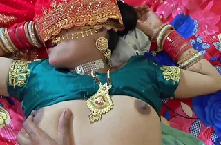 Beautiful Indian couple submerged in passionate bedroom activities
