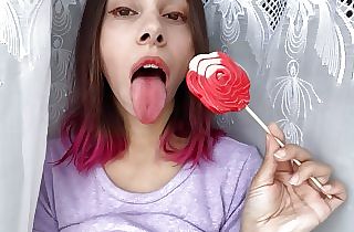 Mischievous sis sucks a lollipop and flashes her lengthy super hot cool tongue