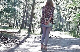 Handcuffed girl ambles in the woods with the hitachi inside her diaper